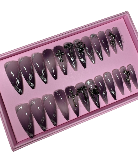 Purple aura stiletto nails